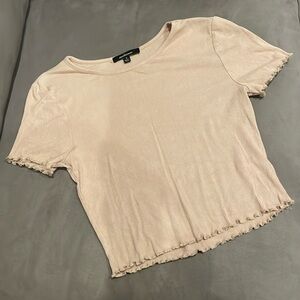 small cropped tee shirt with cinched edges